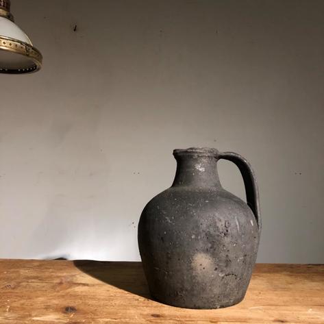 Black primitive vase