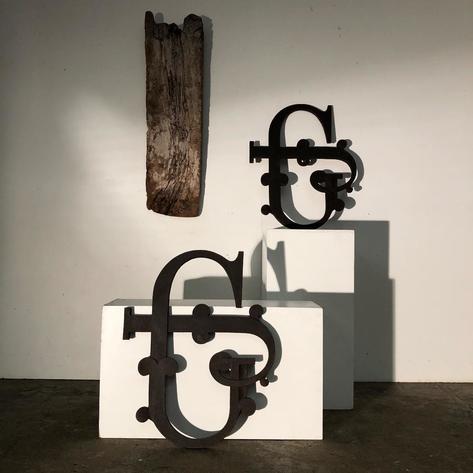 Cast iron 1920 G J sign 