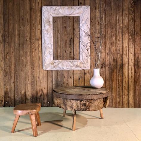 Large round primitive side table