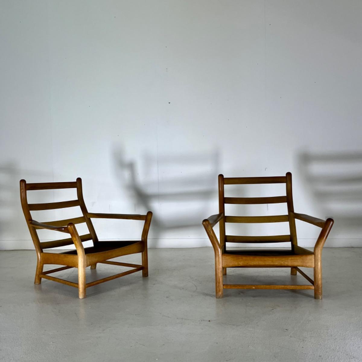 Pair of 1960 large oak armchairs 