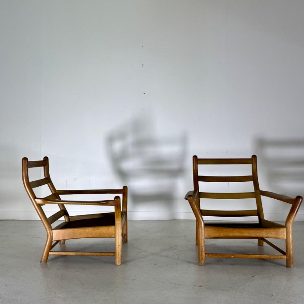 Pair of 1960 large oak armchairs 