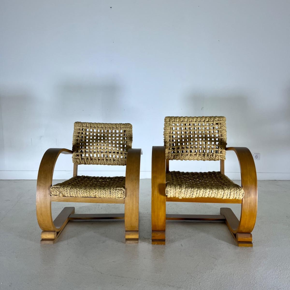 Pair of audoux minet rope armchairs 