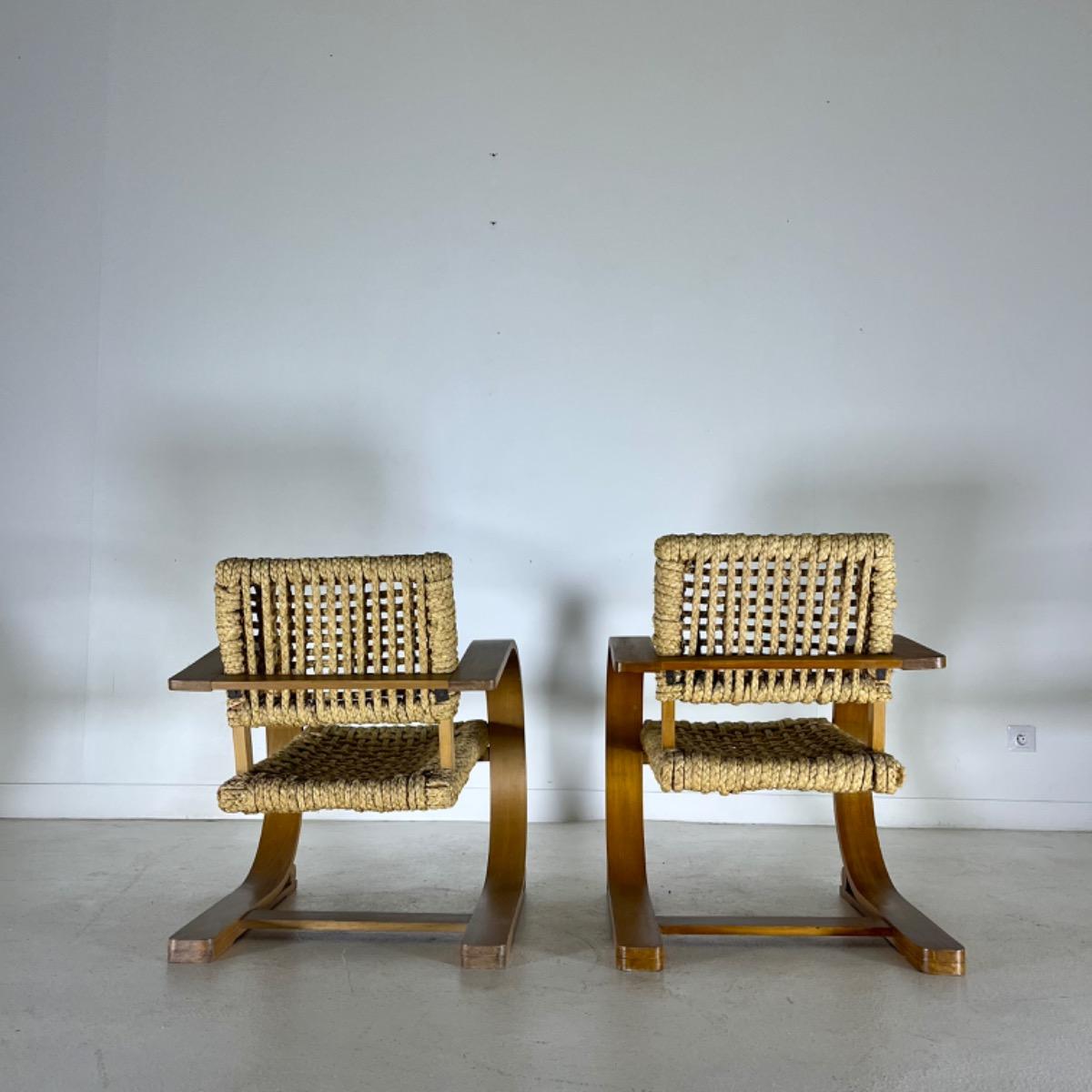 Pair of audoux minet rope armchairs 