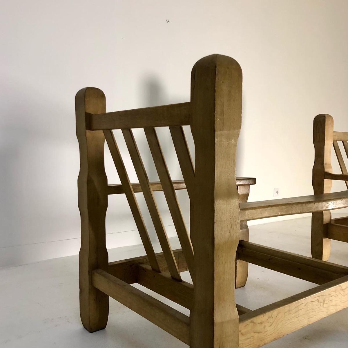 Pair of large primitive armchairs 