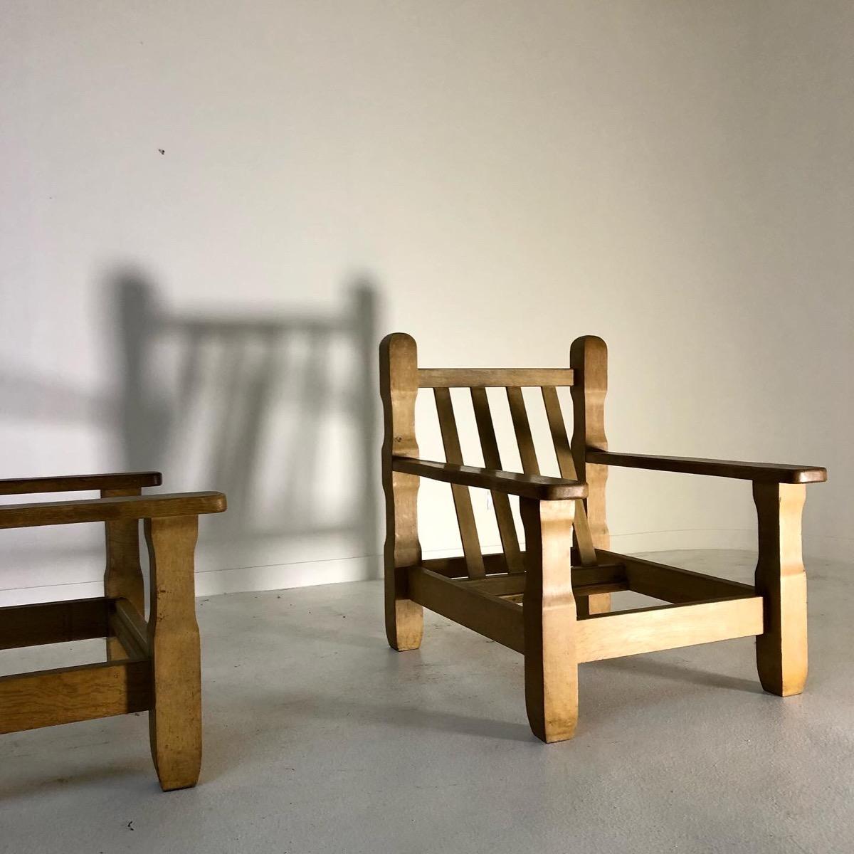 Pair of large primitive armchairs 