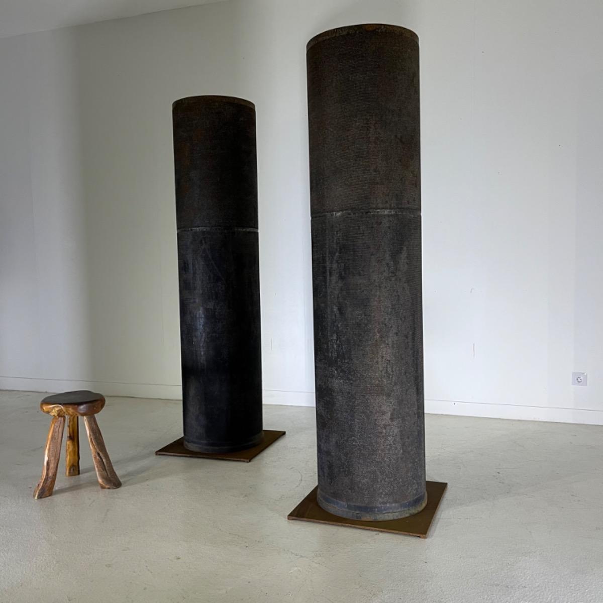 Pair of metal columns 