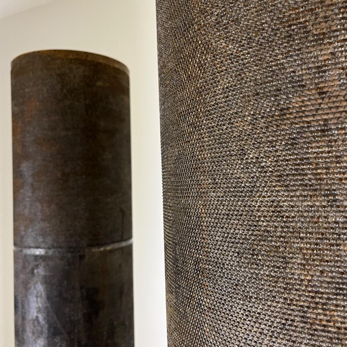 Pair of metal columns 