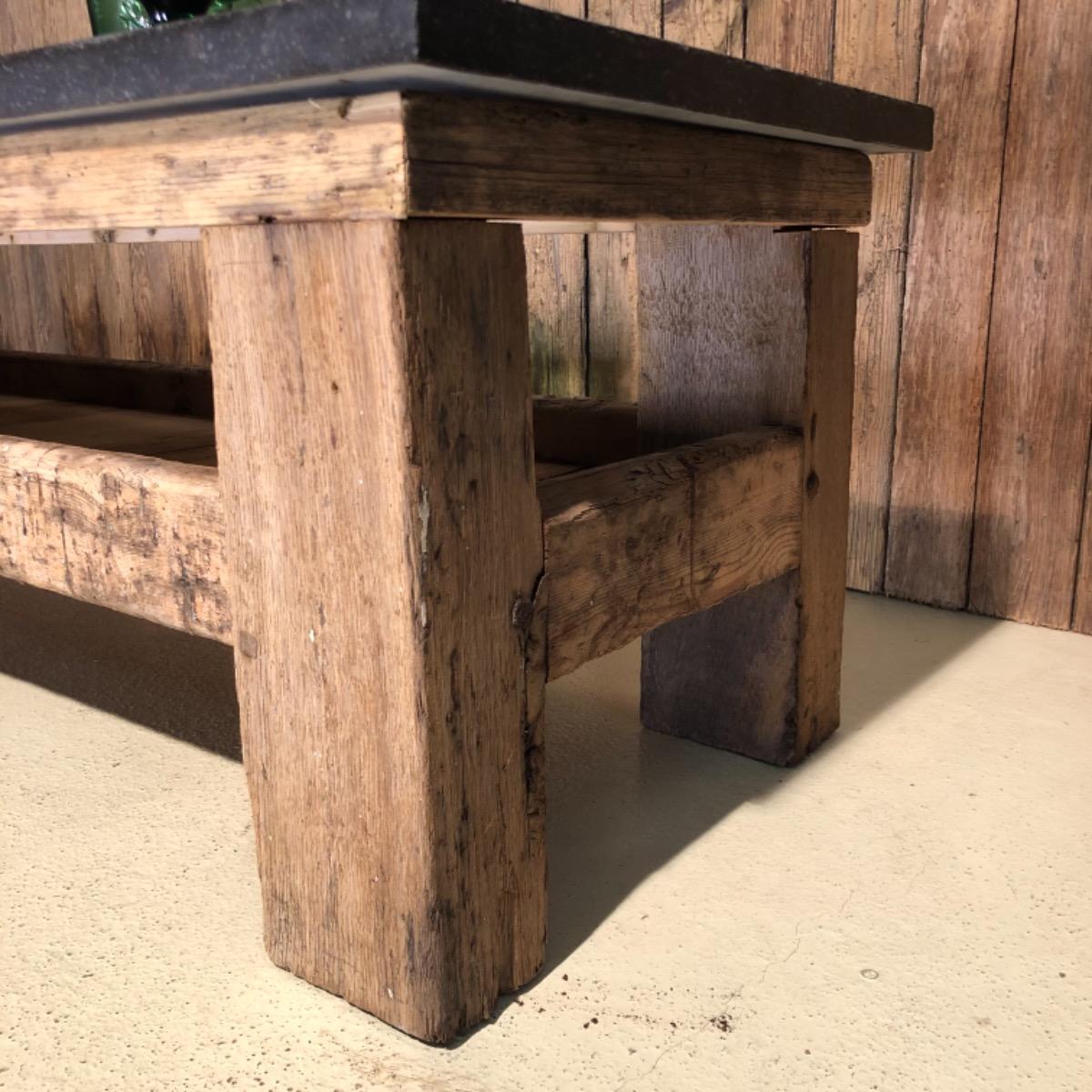 Primitive coffee table with stone top