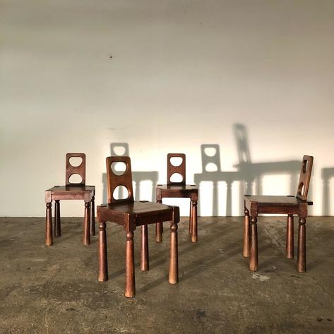 Set of 4 curious design chairs 