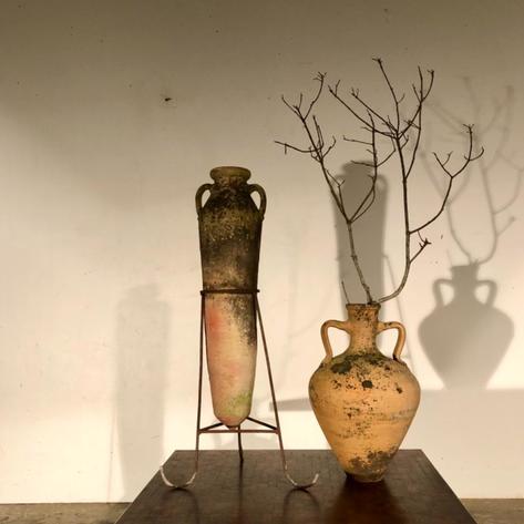 Two decorative terra cotta vases